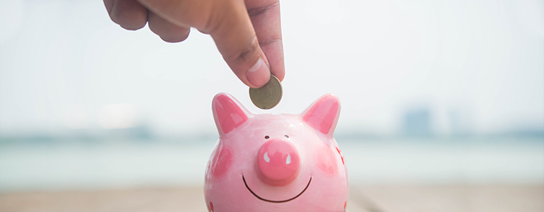 saving money in a piggy-bank